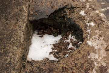 Huge pit on bad broken road