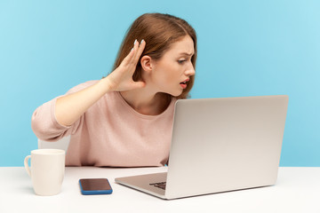 I can't hear, Woman holding arm near ear trying to listen secret talk on video call on laptop, bad...