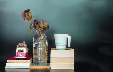 still life with books, a cup of coffee and flower background, wallpaper