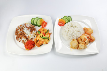 Turmeric fried chicken ayam goreng kunyit black sauce rice and butter chicken rice