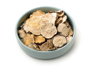Peruvian ginseng or maca Lepidium meyenii, dried root and pow ，slice on a white background 