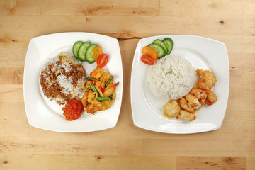 Turmeric fried chicken ayam goreng kunyit black sauce rice and butter chicken rice