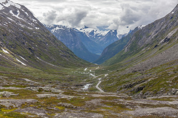 Norway, Beautiful View Of Mountain with cloudy sky and Green Valley, Norway Mountain Landscape selective focus