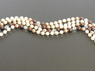 pearls in beads. round stones in placers.