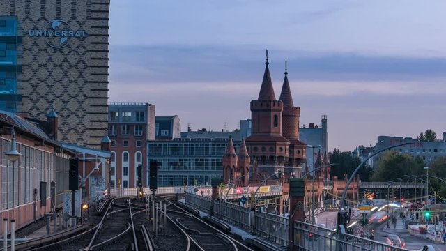 Berlin sunset timelapse at famous Oberbaum Bridge, Warschauer Station, Germany.