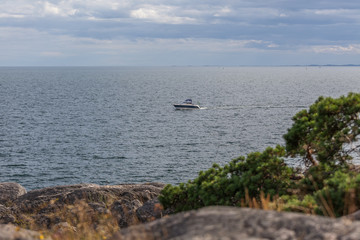 boats on a Baltic Sea seen from a beach in Sweden