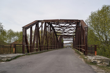 ancient german metal bridge across the river
