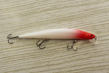 Fishing lures tackle and bubbles for fishing on a Wobbler Field with a clipping path.