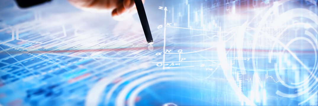 Business concept. Information technology and data processing. Hands over the screen with graphic data. A modern software product in business.