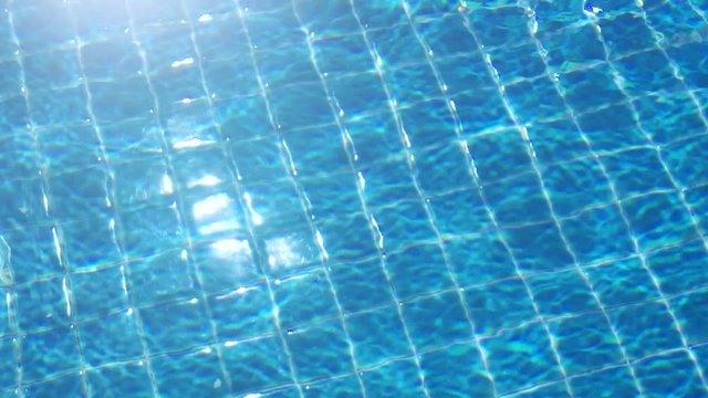 blue water in the pool with light reflections