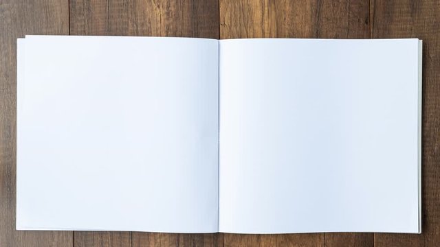 4k stop motion hand open blank page book.