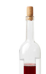 Closeup of a red wine bottle on a white background