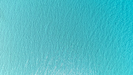  Calm clear blue sea water background. Blue azure sea water texture. 