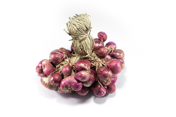 Shallot, separate on a white background, fresh shallots on a wooden background