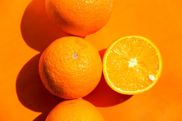 oranges on an orange background