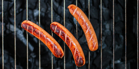grilled sausages, charcoal bbq menu concept. food background. top view copy space for text