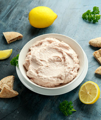 Taramasalata dip made with fish roe in white bowl