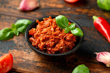 Sun dried tomato pesto with chilli, garlic and herbs in bowl