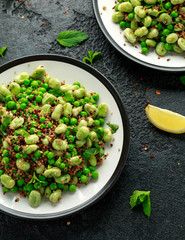 Vegan Green broad beans and quinoa salad with sweet peas and mint. Healthy food.