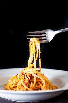 "Poor Mans Pasta". Traditional Italian pasta dish of spaghetti, anchovy, tomato herbs and spices.
