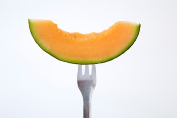 Fork with Sliced Cantaloupe melon