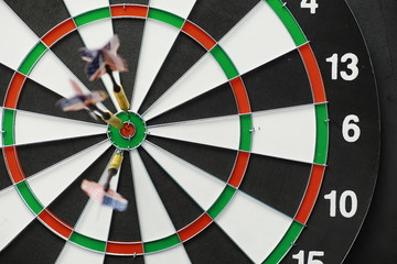 Darts. The dart for playing in the game board is stuck. Hit the sector in darts. The concept of a...