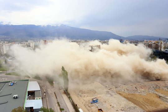 Controlled explosion with blasts of a unfinished and abandoned empty high building, printing press house IPK Rodina, in Sofia, Bulgaria on 04/26/2020.