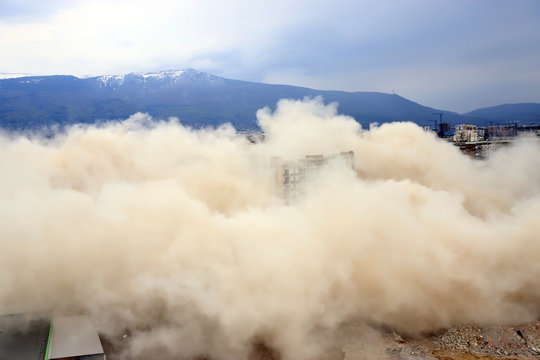 Controlled explosion with blasts of a unfinished and abandoned empty high building, printing press house IPK Rodina, in Sofia, Bulgaria on 04/26/2020.
