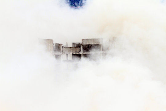 Controlled explosion with blasts of a unfinished and abandoned empty high building, printing press house IPK Rodina, in Sofia, Bulgaria on 04/26/2020.