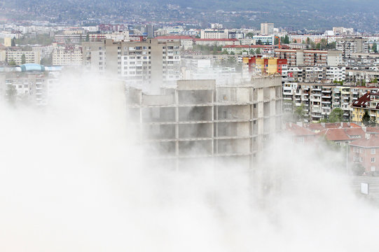 Controlled explosion with blasts of a unfinished and abandoned empty high building, printing press house IPK Rodina, in Sofia, Bulgaria on 04/26/2020.