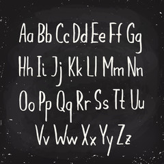 Fototapeta na wymiar Hand drawn alphabet written with pen in blackboard design.