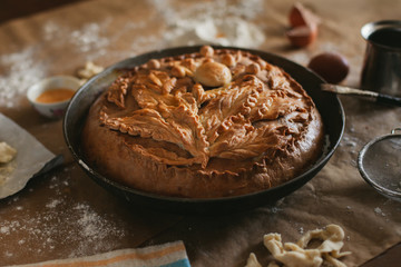 large homemade decorated cake of a beautiful Golden color