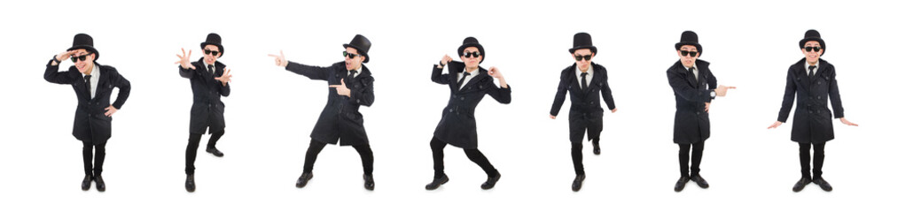 Young detective in black coat isolated on white