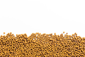Above or Top view of animal food. Brown Dried dog food on white background. Grain pet food banner background with copy space for text design.