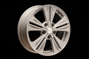 new aluminum alloy wheel, silver color on a black background