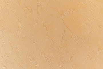 modern beige background, texture plaster patterns. yellowish tint.