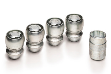 car lock nuts, wheel nut that protect the wheels from theft. close-up of the isolate on a white background