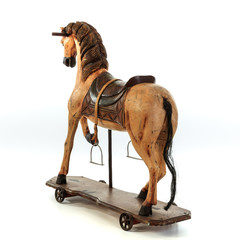 vintage wood rocking horse on white background