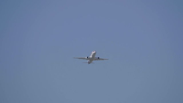 Commercial passenger airplane Sukhoi Superjet 100 flying demonstration flight of the international aerospace salon MAKS-2019.