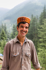 portrait of a man from himachal pradesh, India with traditional himachali cap