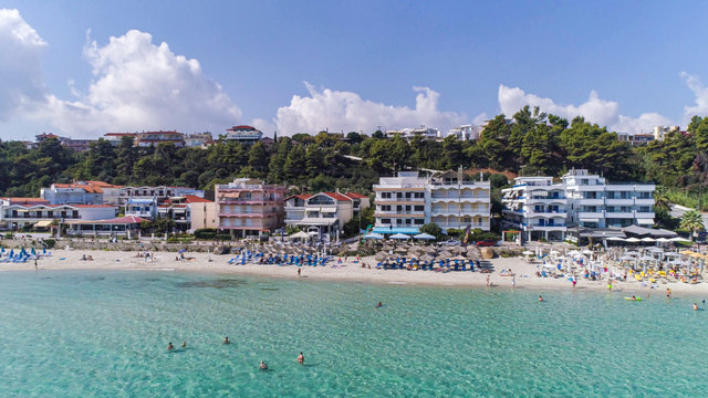 Aerial picture. Tourists on the beach of Kallithea town, Halkidiki, Greece. 