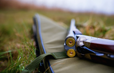 Hunting rifle with a bullets. Sport and recreation concept