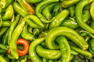 green and red hot chili peppers in the market