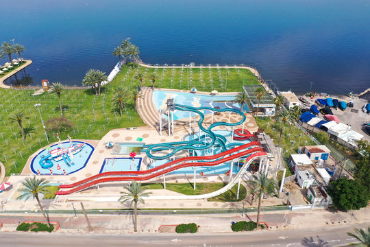 Corona Virus lockdown, Aerial image of a large and empty Water park with various Water slides and pools due to government guidelines.
