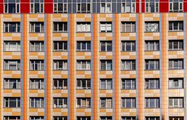 Windows of old buildings in Saint Petersburg, background-symmetry in buildings. 