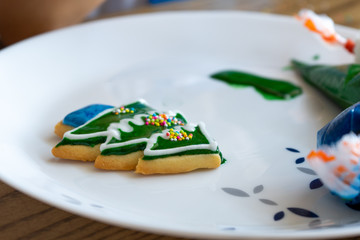 Selective focus on the little sugar balls on the cookie during bakery workshop at home