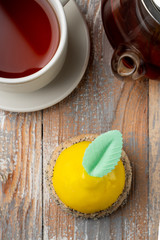 Small lemon tartlet with lemon cream and poppy shortcut base