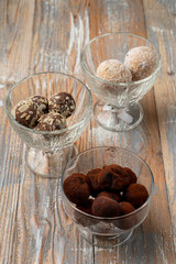 Homemade truffle balls made of chocolate praline and coated in cocoa powder