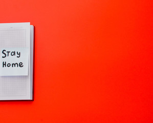 open notebook with a sticker that says 
