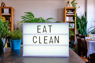 Lightbox written "Eat Clean" with cinema letters. Concept for eating healthy food. Healthy Lifestyle.
